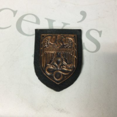 Copy of an undistributed 3rd Reich Warschau 1944 shield arm badge, A collection of Rotary watches, a collection of tie pin sets by Stratton, a a rare Port logo, German militaria and more.