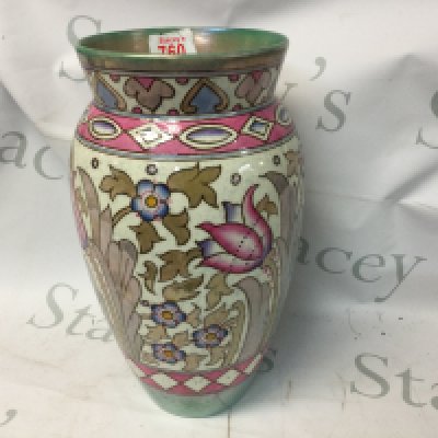 A Charlotte Read tube lined Art Deco vase decorated with flowers and foliage.32 cm .