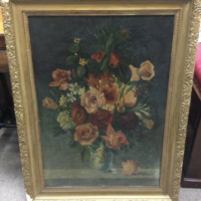A gilt framed still life oil painting of a vase of roses, dimensions 67x88cm.