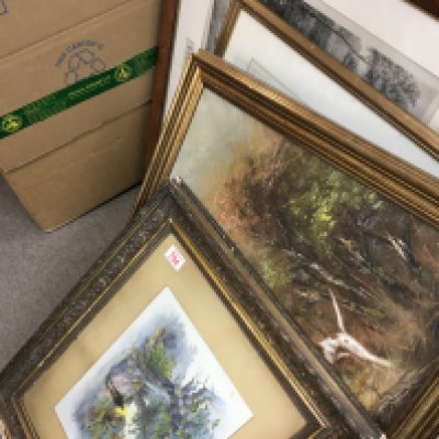 A collection of framed photos including prints, oil and canvas and more.