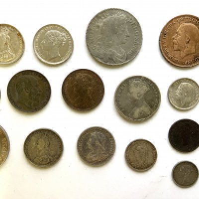 A mixed collection of British and world coinage, to include Charles II 1677 half crown.