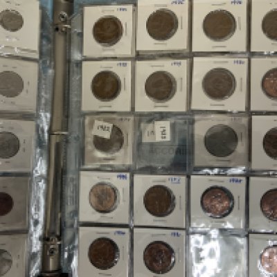 3 Albums of British and world coinage.