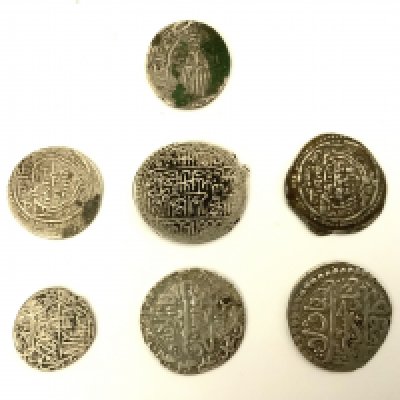 A small collection of early Rupees. (A)