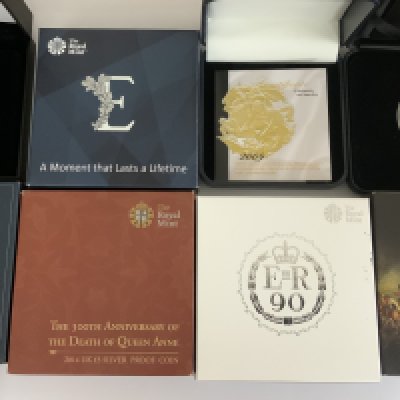 11 Silver proof presentation commemorative cased coins.