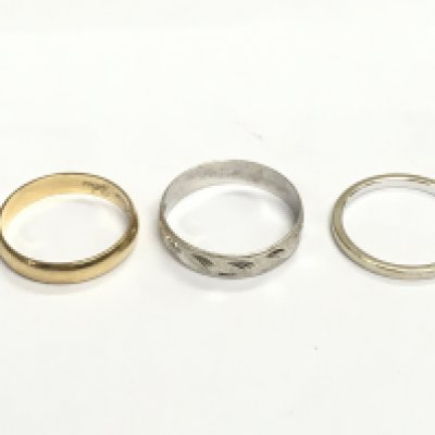 Two 9ct gold rings 4.49g and a 14ct gold ring 2.26g Postage A