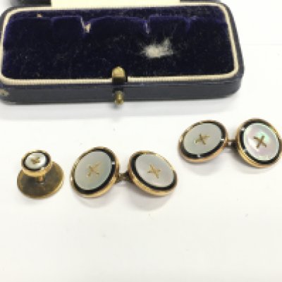 WITHDRAWN A set of gents 9ct gold studs. 6.13g