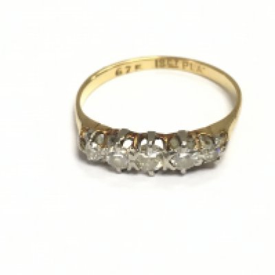 An 18ct gold ring set with a diamonds. Size N and 2.03g