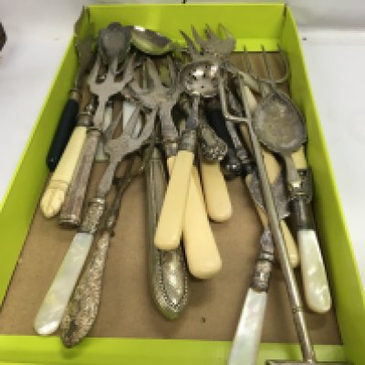 A Collection of meat forks and preserve spoons . MO RESERVE