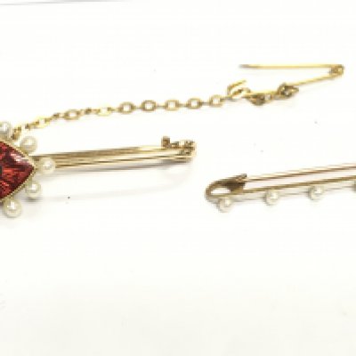 An enamel and pearl brooch and a 14ct gold and platinum pearl brooch. Postage A