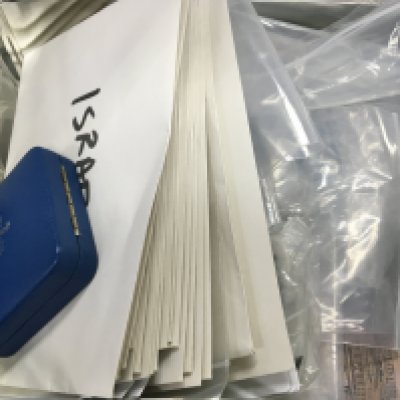 A 1977 silver crown, and other used circulated world coinage and bank notes . Postage category B