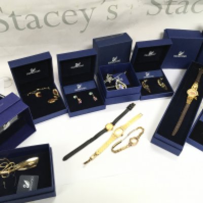 Boxed Swarovski jewellery including a crystal necklace , floral earrings, Topaz necklace, Pomeranian watch. Also including some ladies watches Montine, Lusina, Seiko. Postage category b