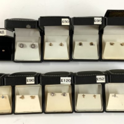 10 pairs of 9ct gold and stone set stud earrings. (A)