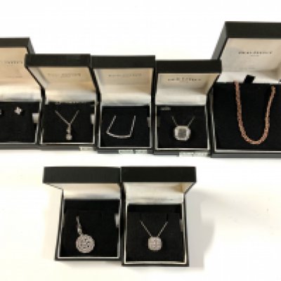 7 Sterling silver and stone set pendants and chains. (A)