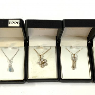 5 9ct gold stone set pendants and chains. (A)