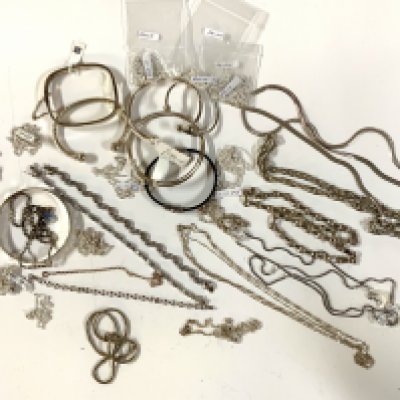 A large collection of sterling silver chains / bracelets and bangles. (A)