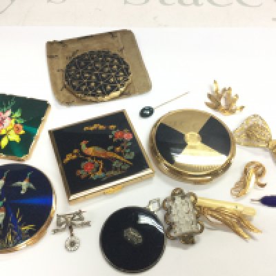 Seven brooches blood stone stick pin five compacts . Postage category B