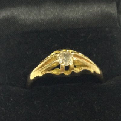 An 18ct gold old cut diamond ring size U. 4.5g total weight. Postage category A