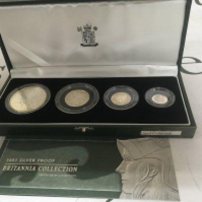 A 2003 Silver Proof Britannia Silver proof collection four graduating coins. In a fitted box with certificate of authenticity.