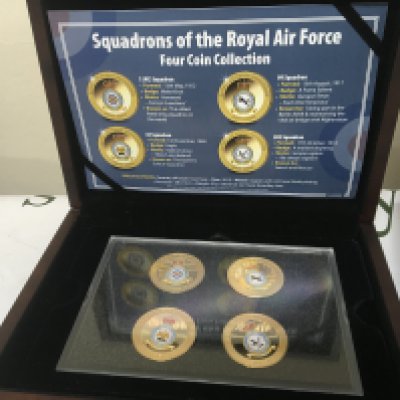 Four cases containing coin collections US presidential dollar Collection Squadron of the Royal Air Force 2008 Royal Shield Proof coins and Diamond Jubilee coin set (4)