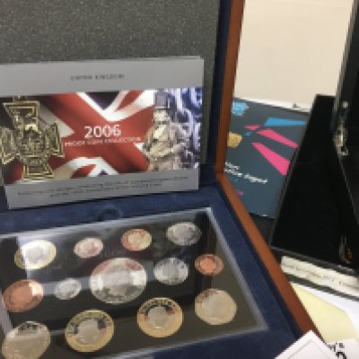 A collection of limited edition and other coins including 2012 Olympic Ingots Battle of Berlin A diamond Jubilee and two Executive Jubilee set.
