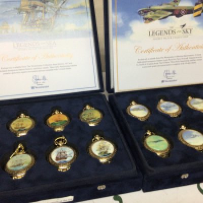 Two cased sets of collectors pocket watches Legends of The Sky and Legends of the Sea. (2)