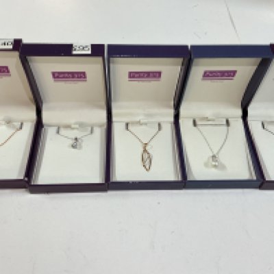 Five 9ct gold (purity 375) chains with stone set pendants.