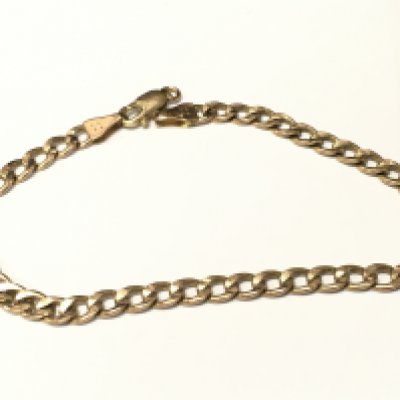 A 9ct hollow small curb bracelet.