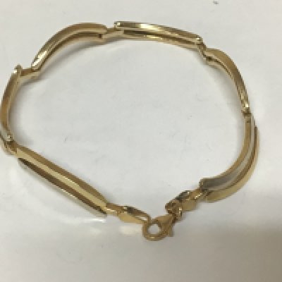 A modern design white and yellow 9carat gold bracelet. Weight 5.8g