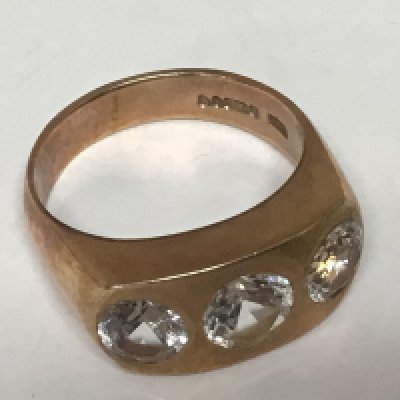 A gents ring 9carat gold ring set with CZ stones weight 10g