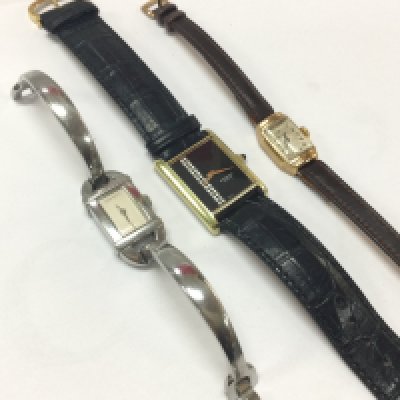 Three ladies watches including a 9 carat gold cased Rotary watch. Postage category A