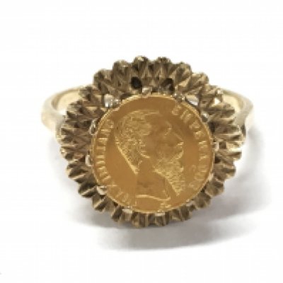 A 9ct gold ring set with a small Maximiliano Emperador coin. 3.6g total weight . Size P. Postage cat A