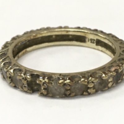 A 9 carat gold gents eternity ring. Size N. 3.1g total weight. Postage category A