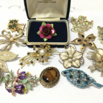 A Collection of various 20th century brooches including a boxed Coalport rose brooch . Postage catA