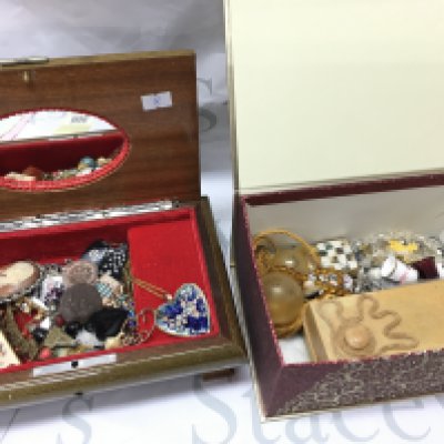 Two boxes of vintage jewellery including pendants, brooches , Thimbles etc. postage category C