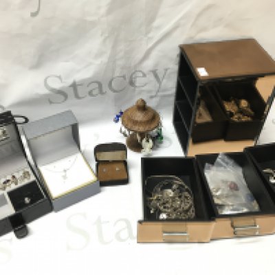 A Collection of mostly silver jewellery including rings, earrings, brooches etc . Postage category B