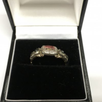 An unmarked Georgian ring set with stones, approx 2.4g, approx size L. Shipping category A.