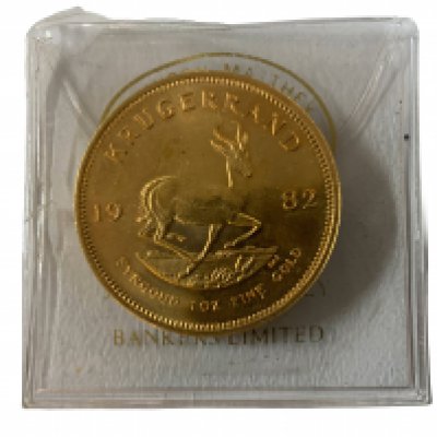A 1980 issue 1 ounce gold Kruggerand coin.