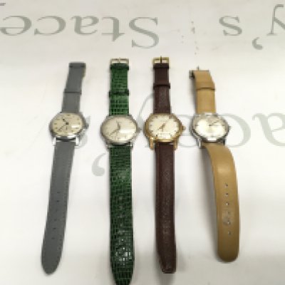 A Collection of four vintage gents wrist watches. Including Zodiac Curtiss etc. All wind and seen running.