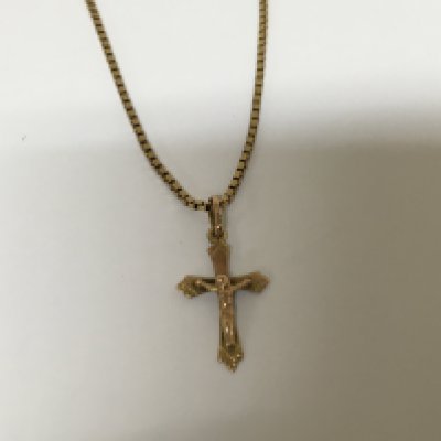 An 18carat gold necklace 7g with a 9carat crucifix pendent attached 1g