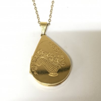 A boxed Mappin & Webb 18cart gold locket of pear shape etched with a basket of flowers weight 10g with an attached 9carat gold chain 1.8g
