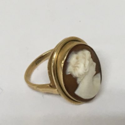 A 9carat gold ring set with a cameo portrait. Weight 3.4g