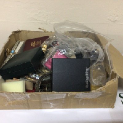 A box containing a quantity of costume jewellery.