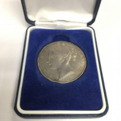 An 1845 Victorian Crown in a fitted case. Shipping category A.