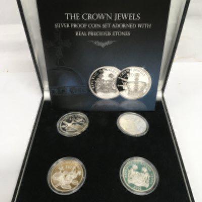 A cased Crown Jewels silver proof coin set. Shipping category B.