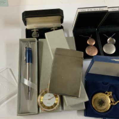 A box of mixed modern jewellery items.