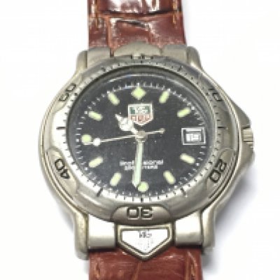 A vintage gents Tag Heuer watch.