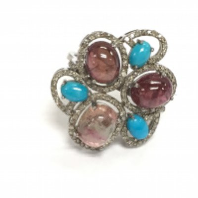 A silver large floral style dress ring with cabochon turquoise and pink and purple tourmalines and diamonds. Turquoise 1.15ct tourmaline 11.74ct and diamonds 0.78ct all approximate. Size P