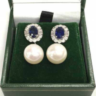 Pair of 18ct white gold droplet earrings set with suspended roundwhite cultured pearls and sapphire and diamond cluster bale. Sapphires 2.17ct and diamonds 1ct approximately