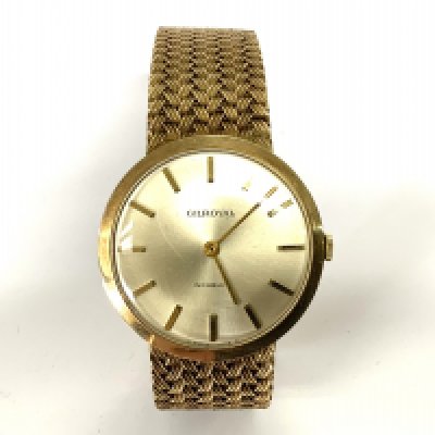 A Gents Gilroyal 9ct gold wristwatch, the woven strap in good order, Full working order. Total weight. 59.9g