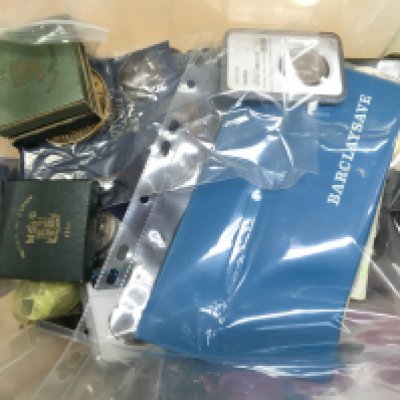 A box of coins including pennies and bank notes . This lot cannot be posted